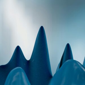 Sleek 3D render of blue peaks with a gradient background, conveying modern abstract art.